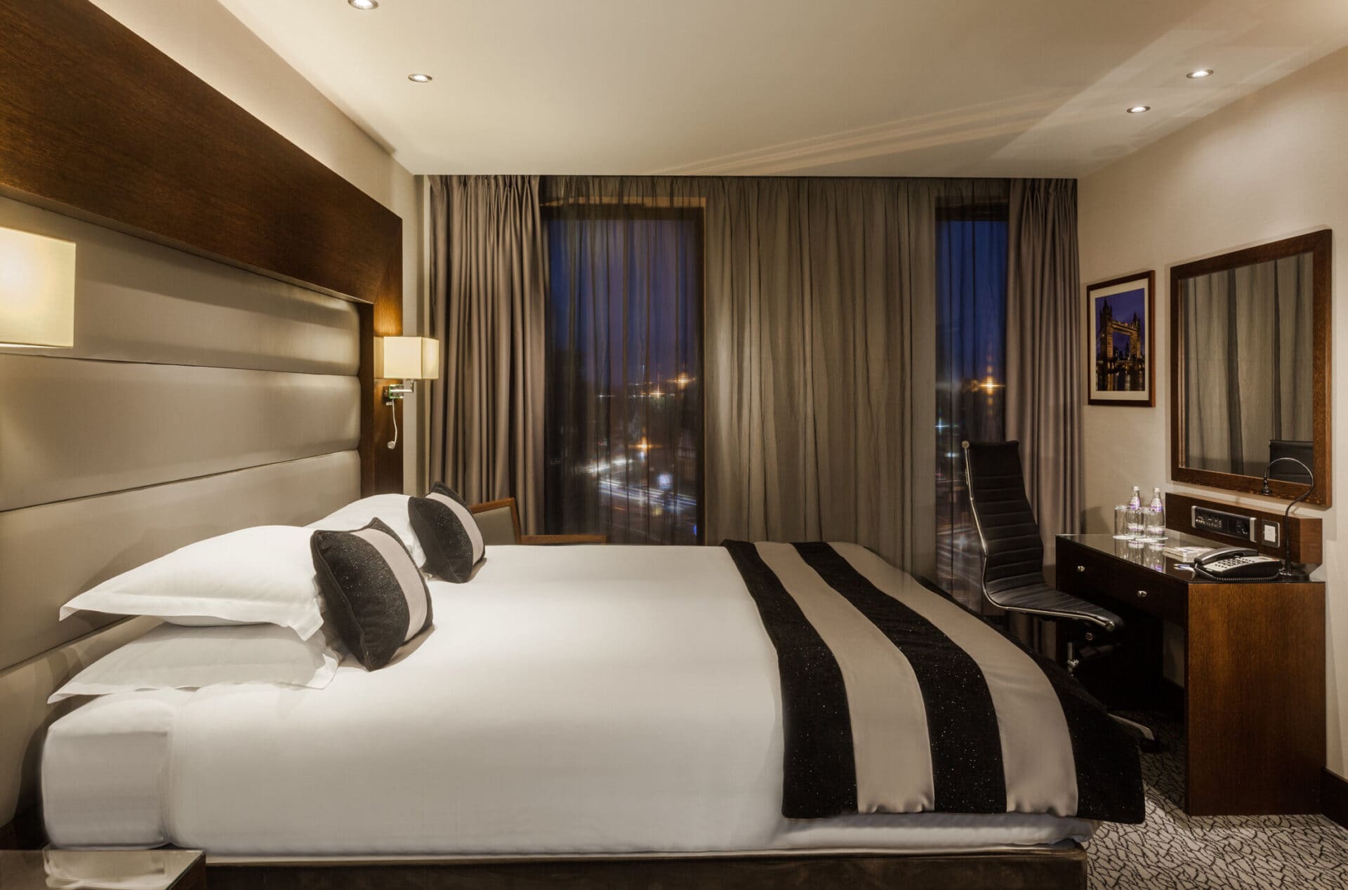 Hotel bedroom with skyline view at Park Grand Heathrow