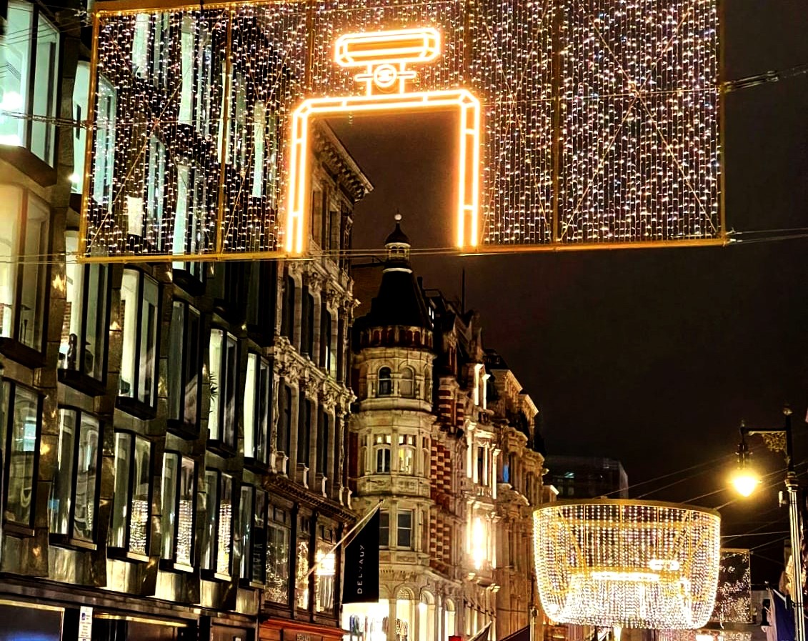 Christmas lights above a Mayfair street in London at night